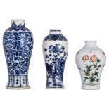 Two Chinese blue and white floral decorated meiping vases; added a ditto famille rose vase, decorate