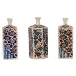 A lot of three Japanese Arita Imari sake bottles, 18thC, H 15 - 15,3 cm
