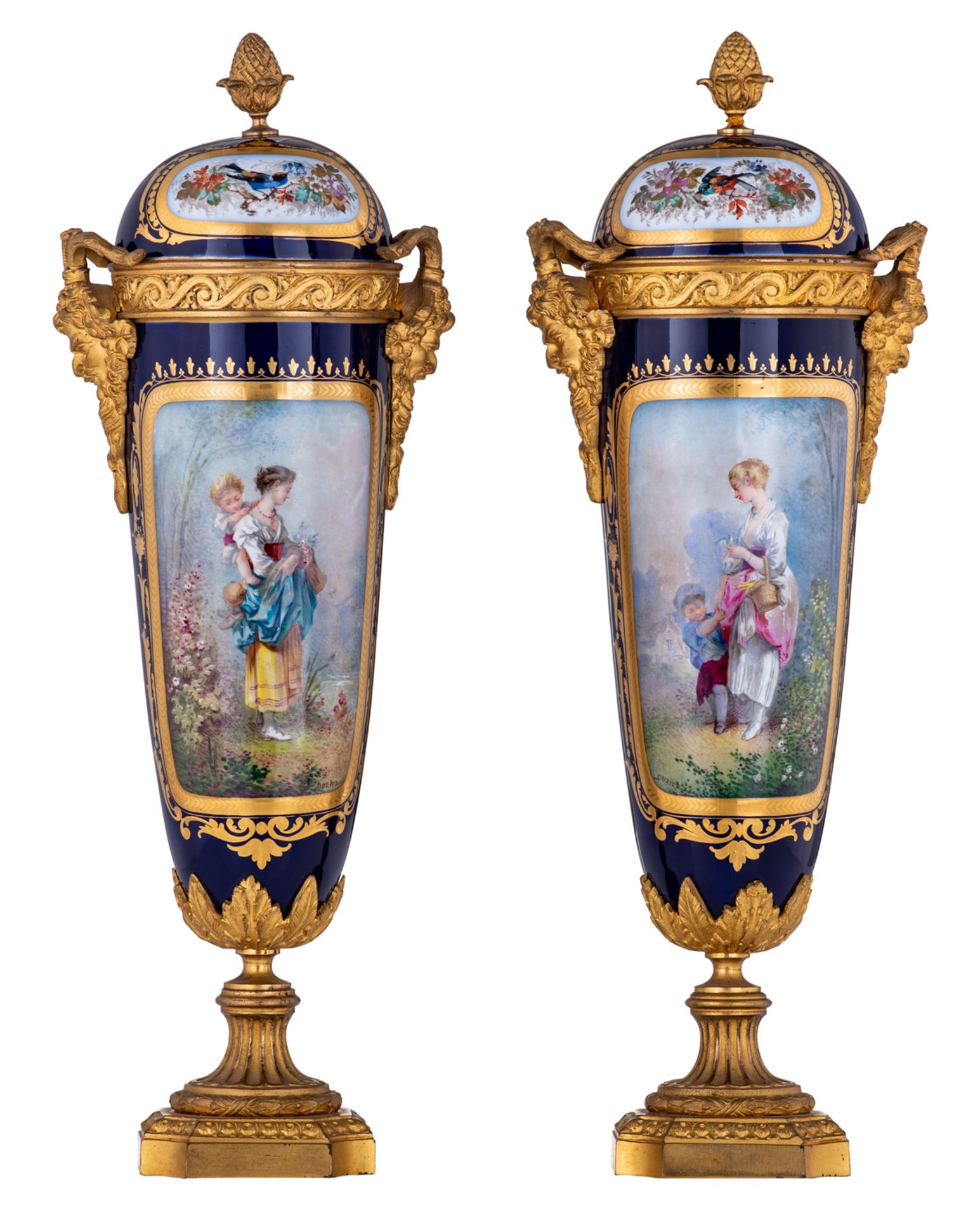 A pair of covered vases with gilt bronze mounts, decorated with a mother and child to the front and