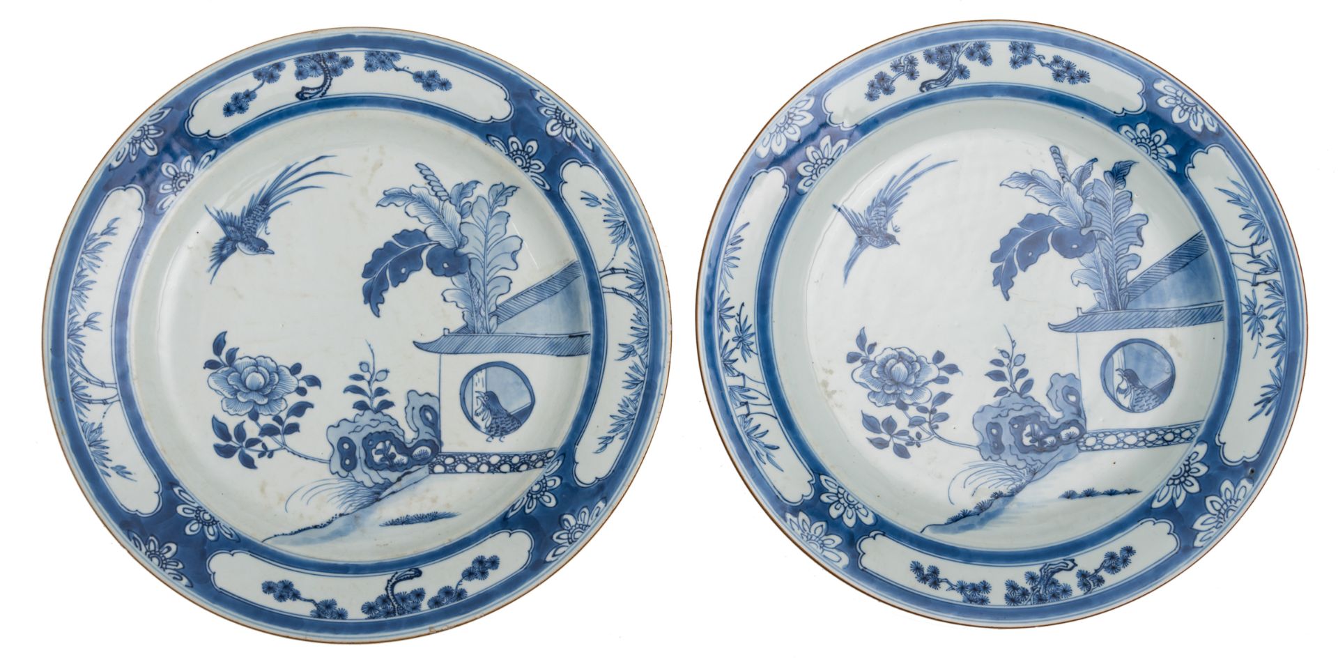 A lot of four large Chinese blue and white plates, decorated in the centre with birds in a garden se - Image 3 of 4