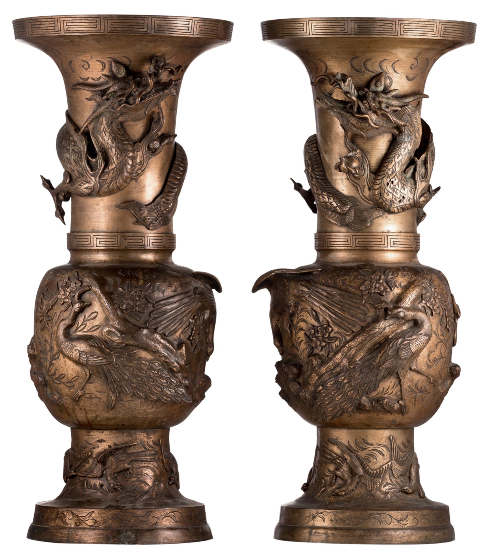 A pair of Japanese gilt bronze ornamental vases, overall relief decorated with birds, flowers and a