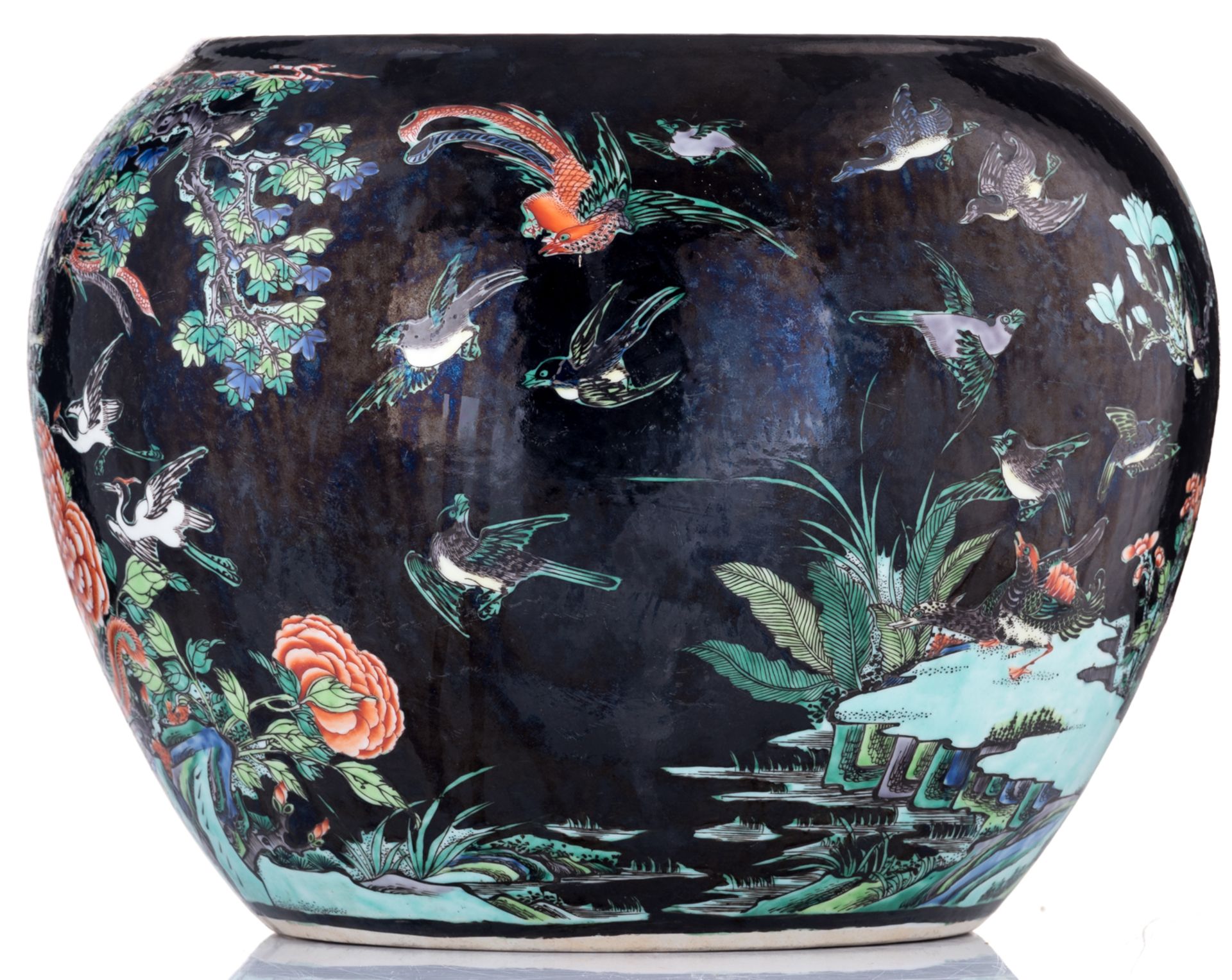 A Chinese black ground polychrome jardiniere, decorated with birds, flowers and a mythical bird, H 3 - Bild 3 aus 7