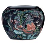 A Chinese black ground polychrome jardiniere, decorated with birds, flowers and a mythical bird, H 3