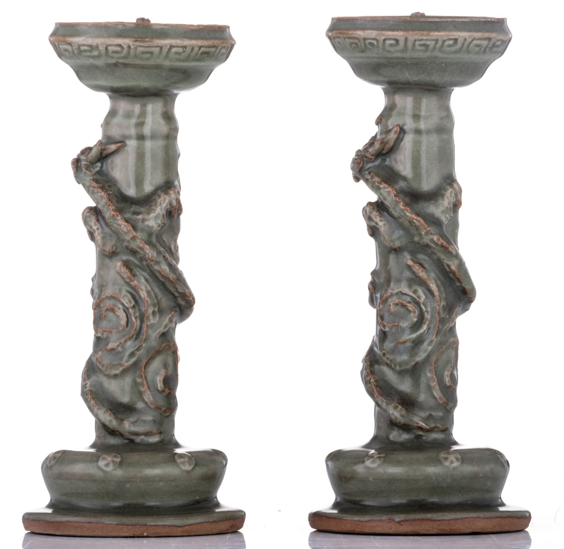 A pair of Chinese celadon stoneware candlesticks, relief decorated with three clawed dragons, Longqu - Image 2 of 6