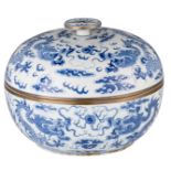 A Chinese blue and white bowl and cover, decorated with dragons chasing the flaming pearl amongst cl