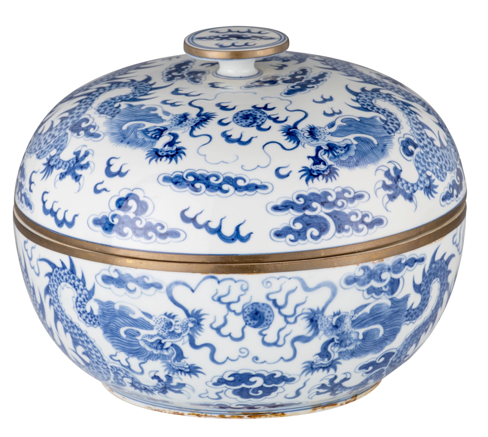 A Chinese blue and white bowl and cover, decorated with dragons chasing the flaming pearl amongst cl