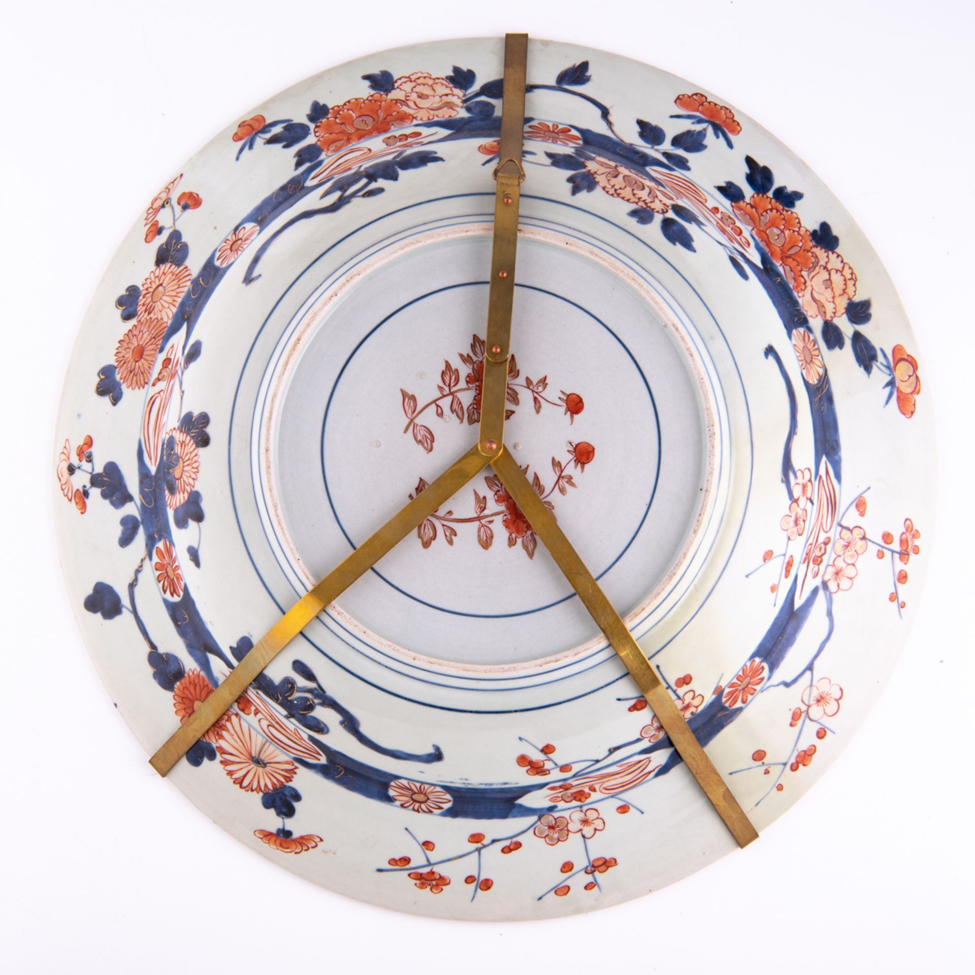 A large Japanese Arita Imari charger, decorated in the centre with a flower basket and roundels with - Image 2 of 2