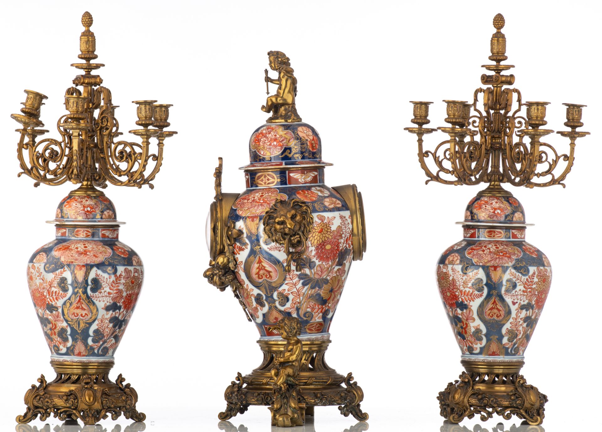 A Japanese Imari porcelain and French parcel bronze mounted three-piece clock garniture, 19thC, H 79 - Image 2 of 6