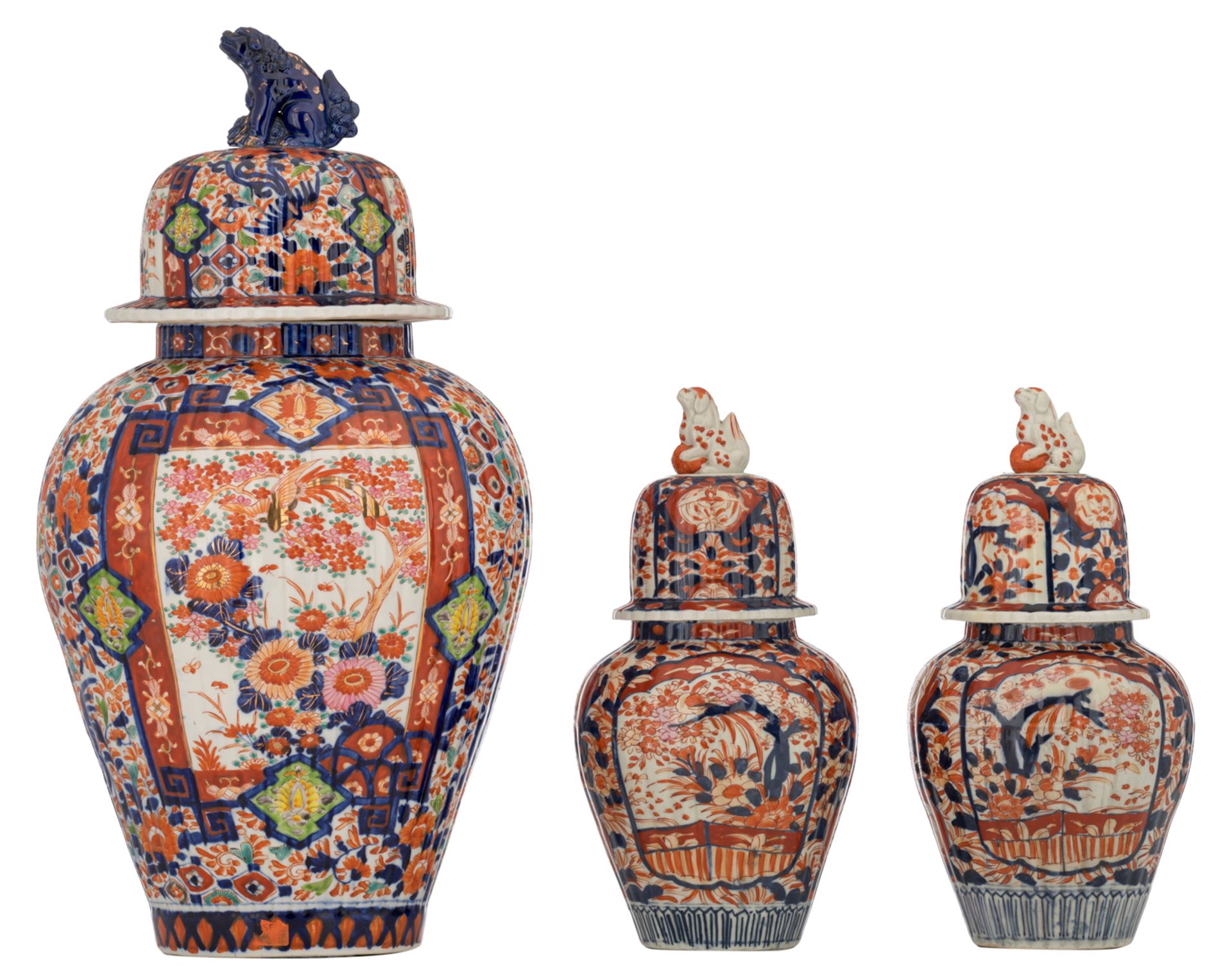 A lot of one large and two smaller Japanese Arita Imari covered jars, late 19thC, H 35,5 - 38,5 cm
