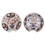 Two Japanese Arita Imari porcelain shaving bowls, decorated in the centre with a flower basket and t