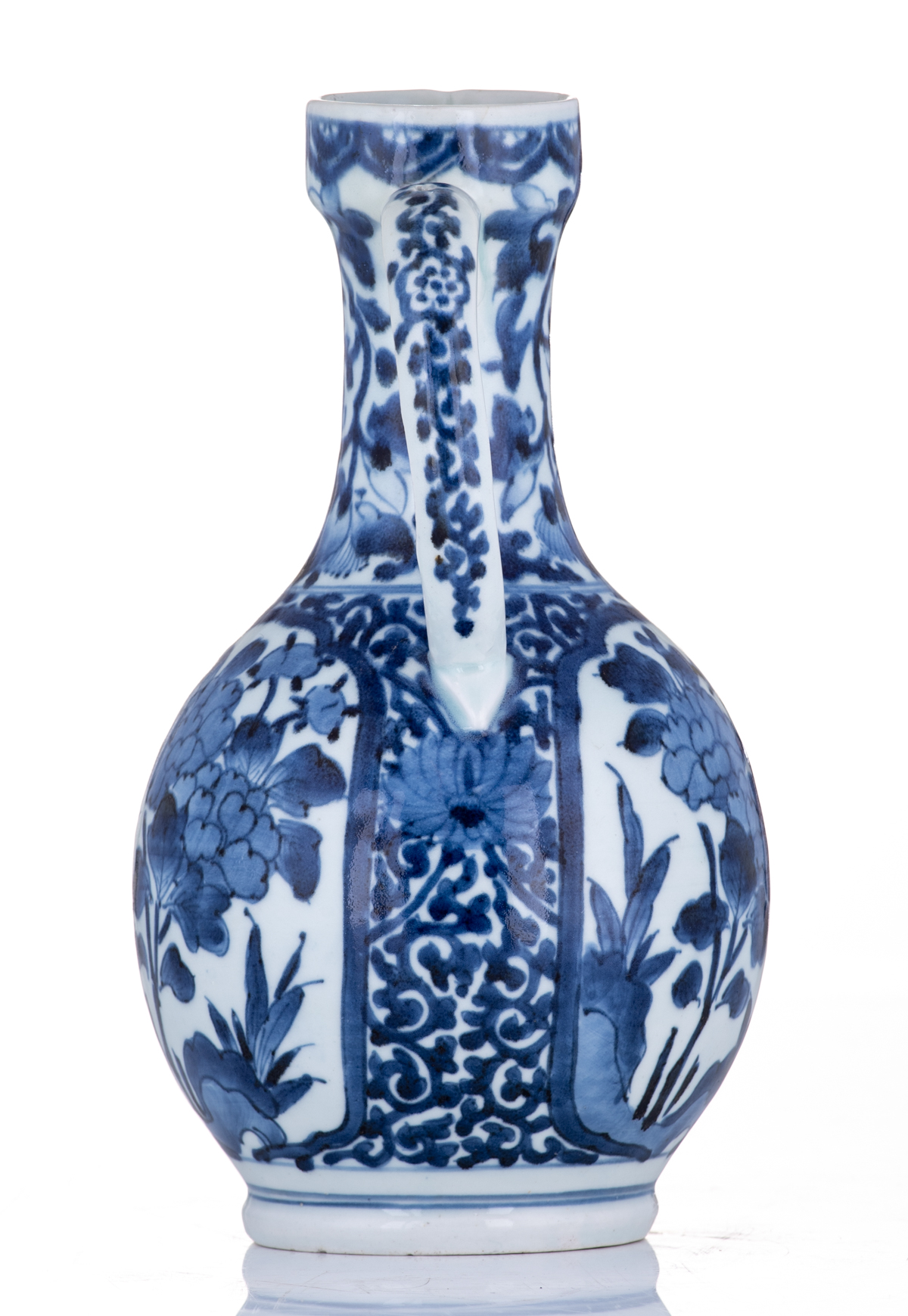 A Japanese last quarter of the 17thC Arita jug, with blue and white scrollwork all over, and roundel - Image 5 of 8