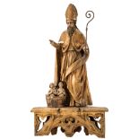 A polychrome painted limewood sculpture of Saint Nicolas, on a gilt Gothic Revival wooden base, 18th