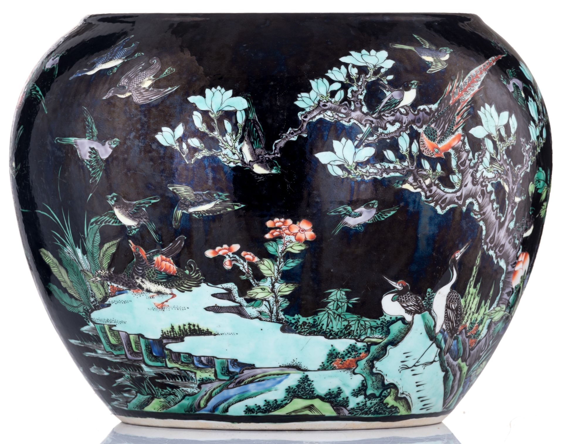 A Chinese black ground polychrome jardiniere, decorated with birds, flowers and a mythical bird, H 3 - Bild 4 aus 7