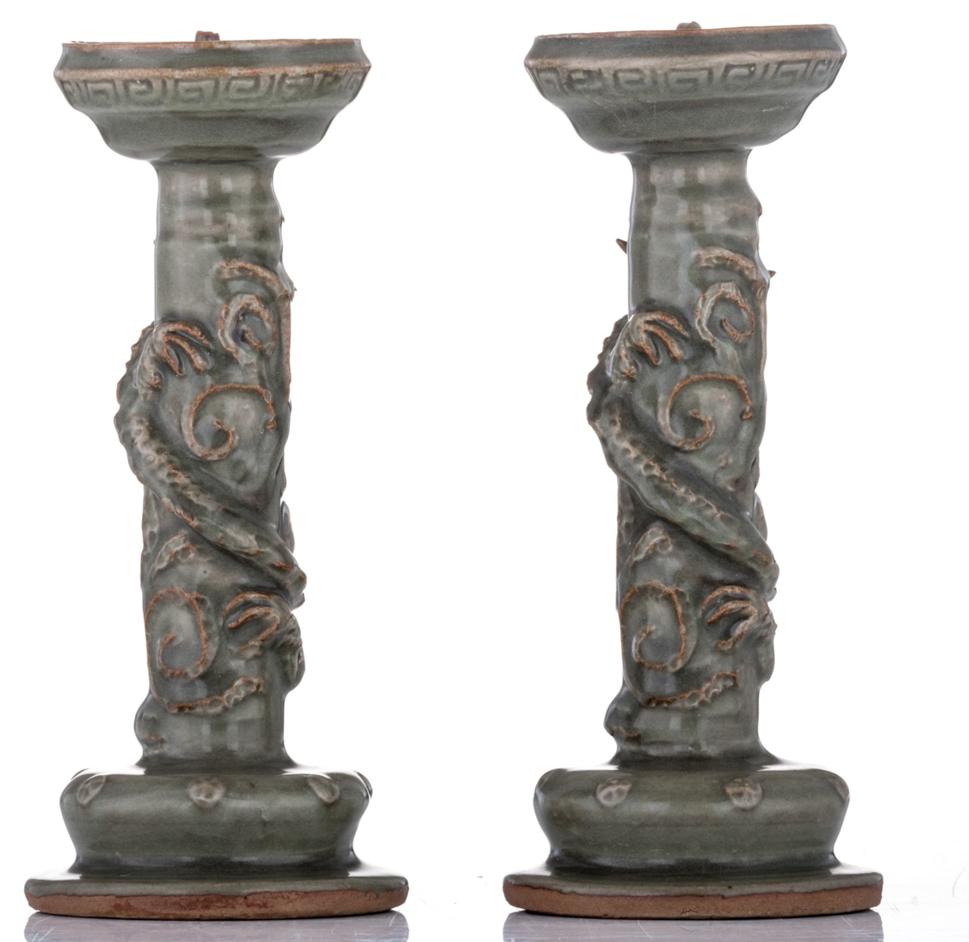 A pair of Chinese celadon stoneware candlesticks, relief decorated with three clawed dragons, Longqu - Image 3 of 6