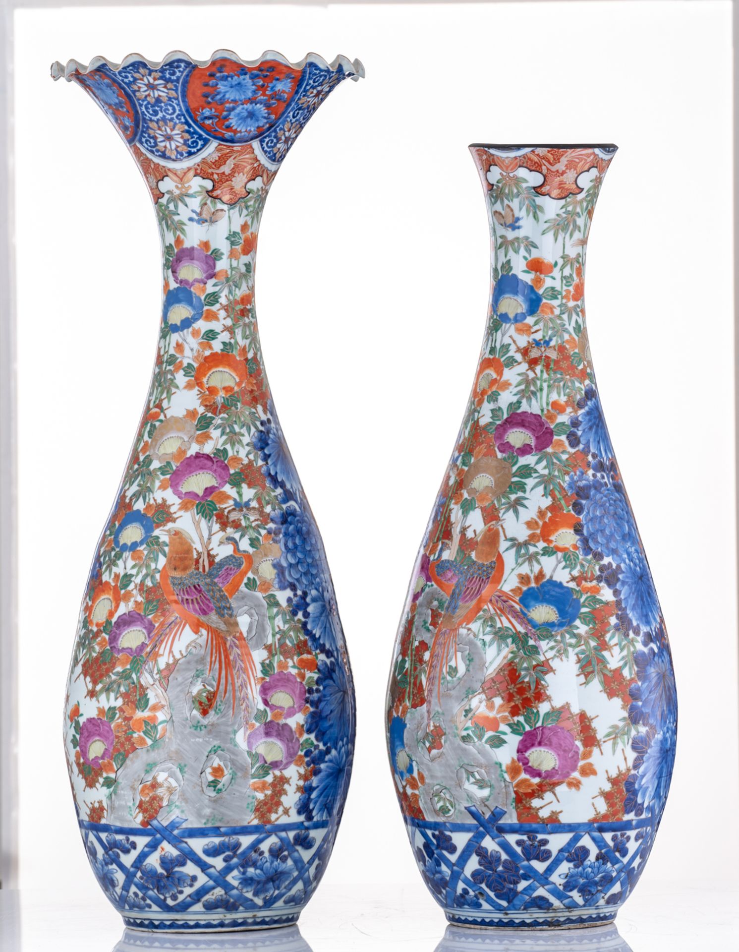 A large pair of Japanese polychrome floral vases, overall decorated with birds and an animated scene - Image 3 of 8