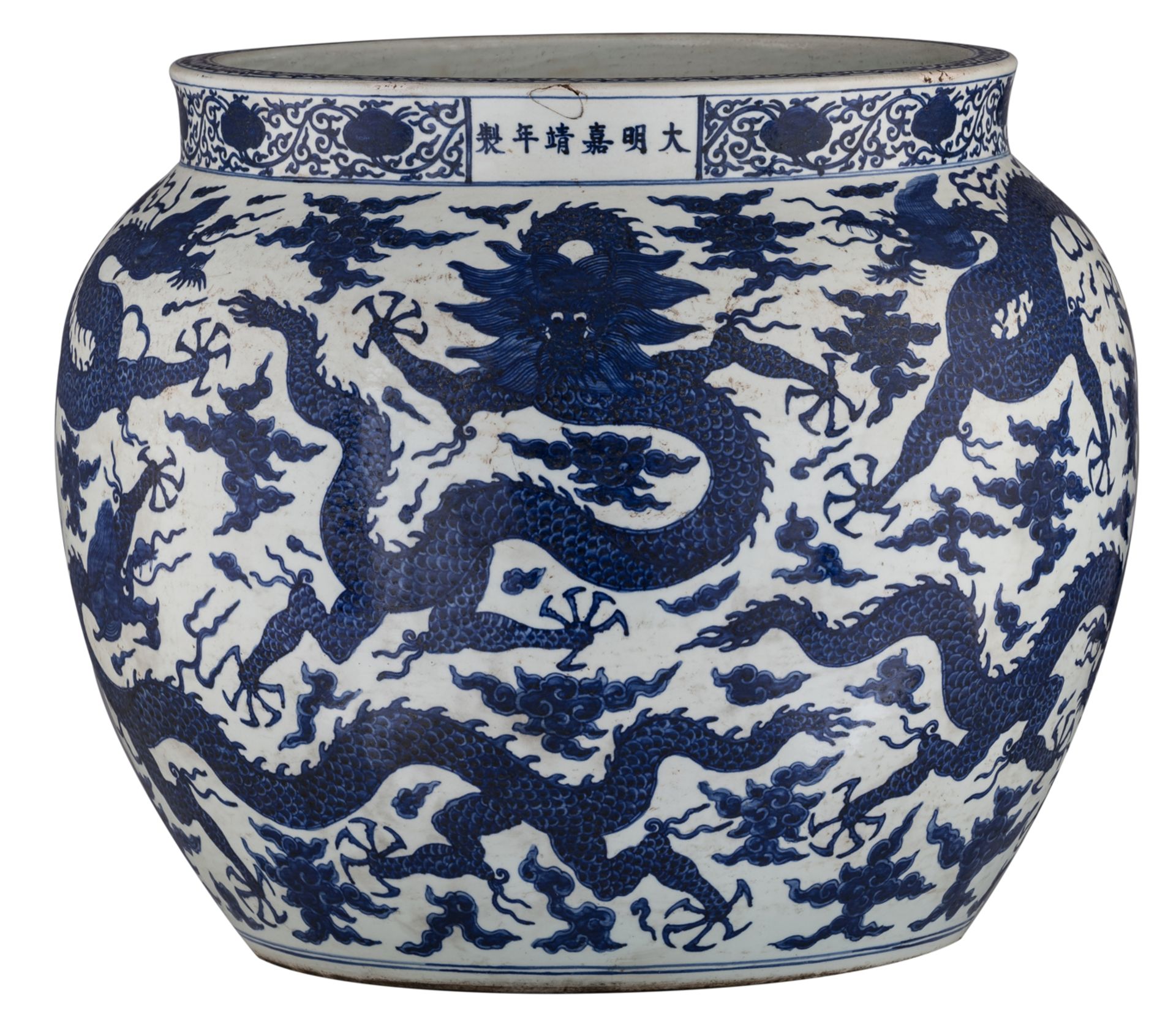 A Chinese blue and white fishbowl, overall decorated with dragons amongst clouds, H 58 - ø 70 cm