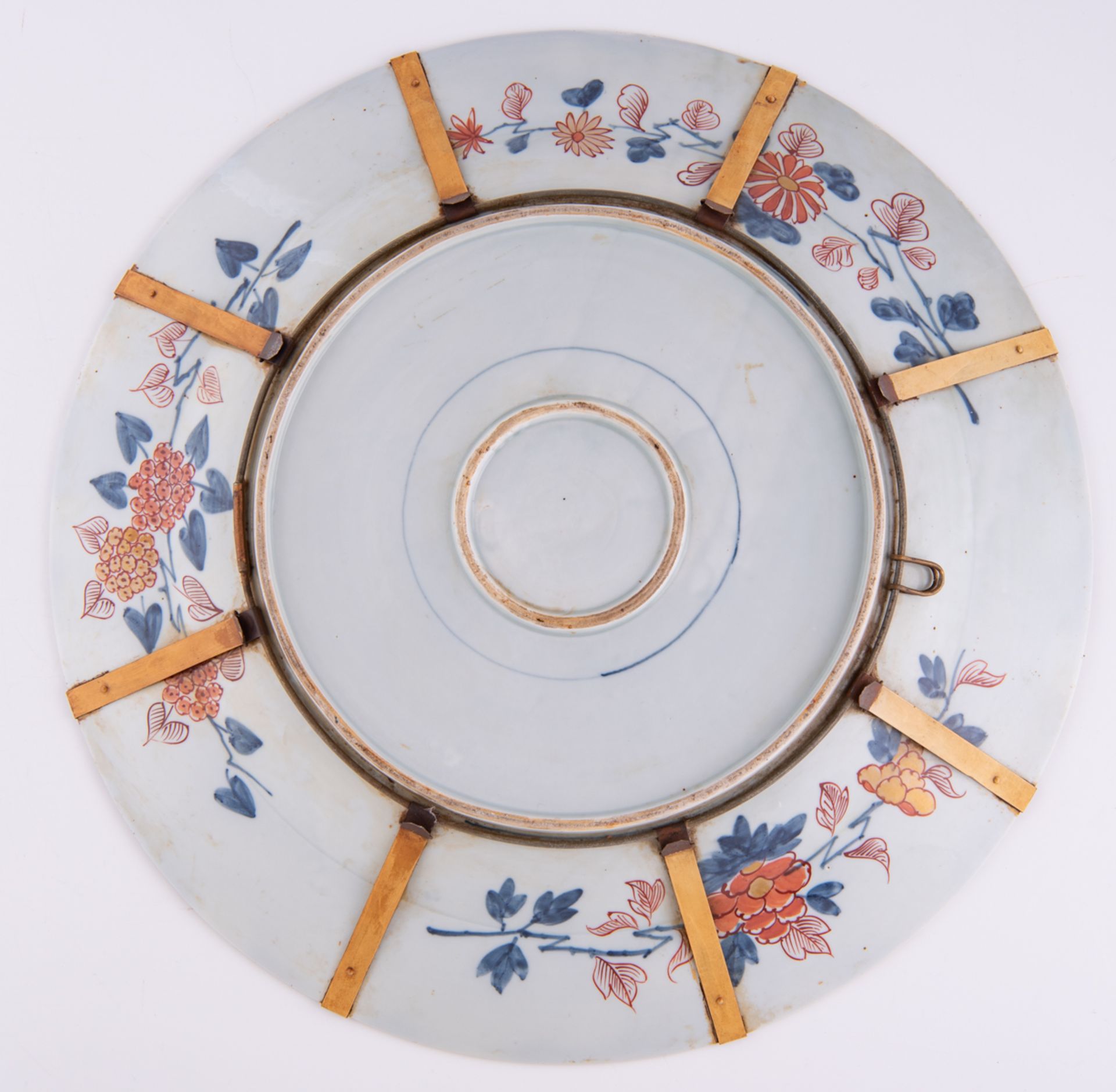 A large Edo period Japanese Imari plate, the central panel decorated with flowers, the roundels with - Image 2 of 2