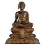A Thai gilt bronze seated Buddha on a three level base, 19thC, H 27,5 cm