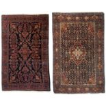 An Oriental woollen carpet, Sarough, 130 x 194 cm; added a ditto carpet, 128 x 190 cm