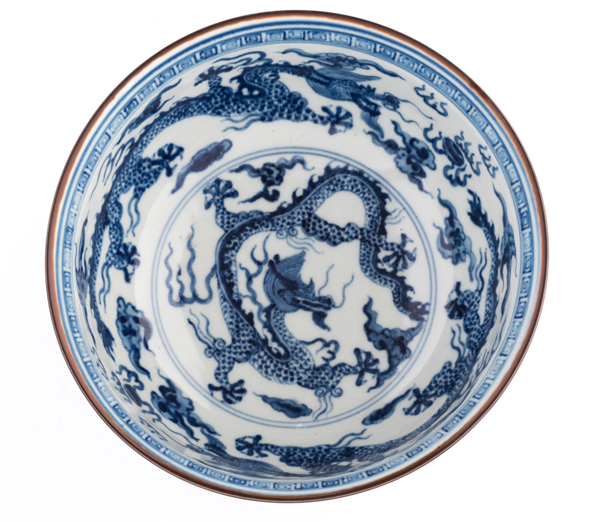 A Chinese blue and white deep bowl, decorated with dragons chasing the pearl, with a Xuande mark, la - Image 6 of 8