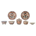 A lot of various Japanese Arita Imari porcelain items, consisting of two dishes, three covered bowls