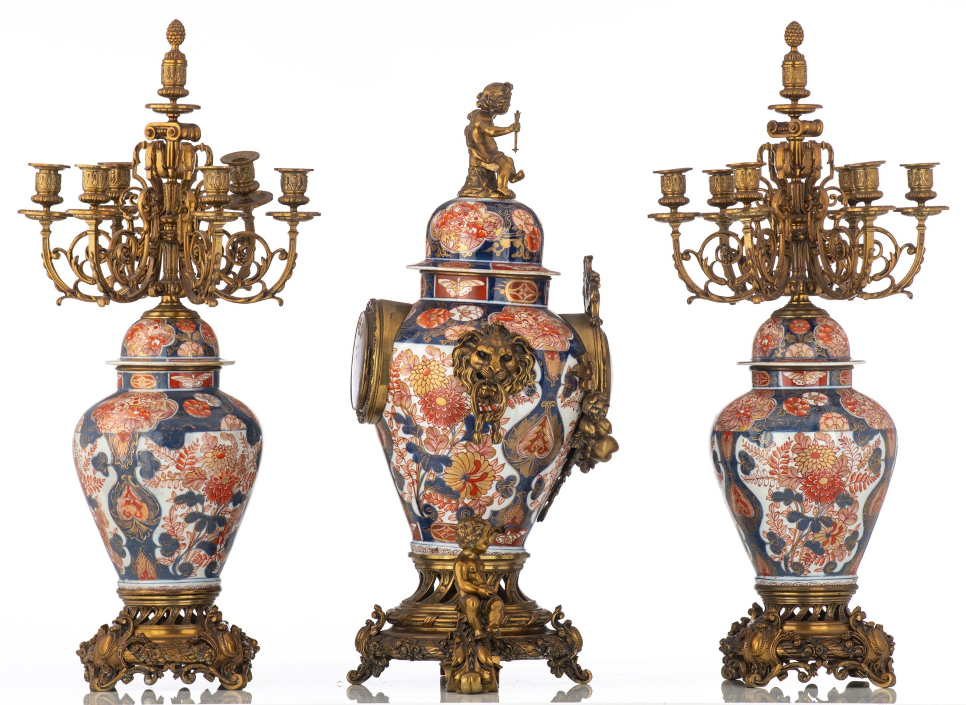 A Japanese Imari porcelain and French parcel bronze mounted three-piece clock garniture, 19thC, H 79 - Image 4 of 6