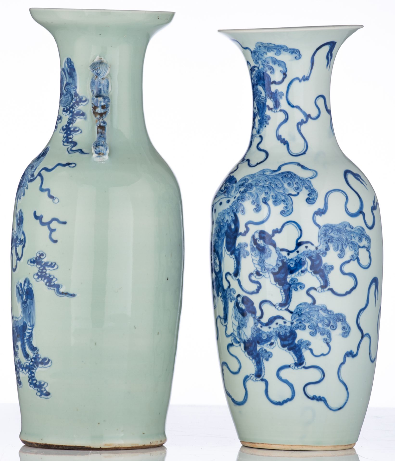 A Chinese celadon ground blue and white vase, decorated with Fu lions, 19thC; added a similar vase, - Bild 2 aus 6