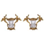 An exceptional pair of gilt bronze and rock crystal rococo vases, the mounts decorated with dragons,