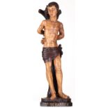 A polychrome painted wooden figure depicting Saint Sebastian, 18thC, H 72,5 cm