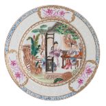 A Chinese famille rose ruby back floral decorated export porcelain dish, the well with figures in