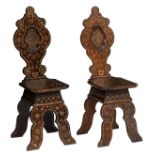 A pair of Renaissance style Italian walnut sgabelli with bone and clear wood inlay in the Oriental