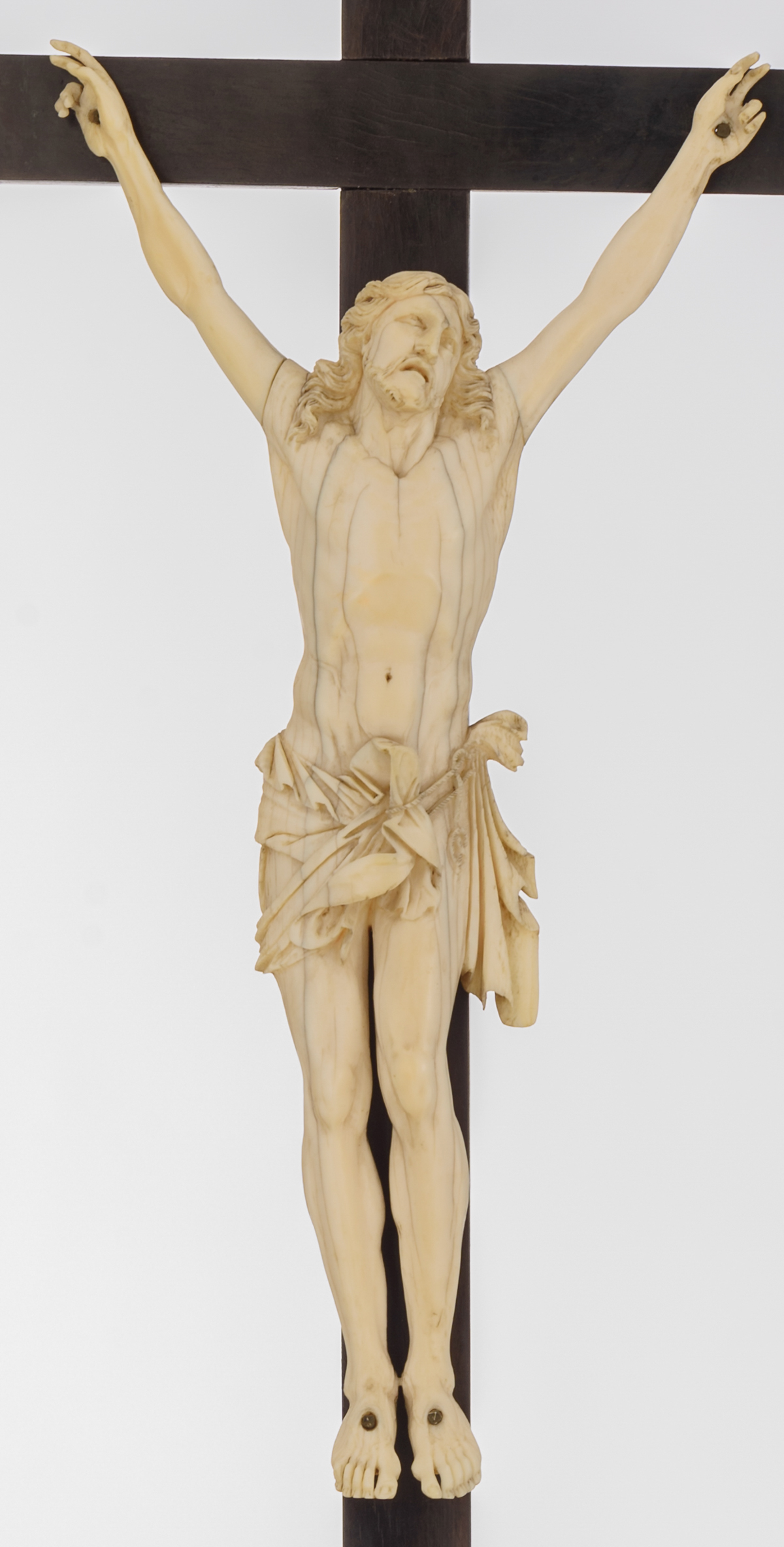 An ivory corpus on a ebonised wooden base, with silver mounts, no visible hallmarks but tested on - Image 4 of 6