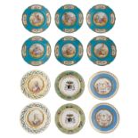 A lot of various polychrome decorated display dishes: two painted with coats of arms and marked