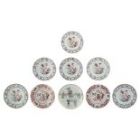 Six Chinese famille rose dishes with a flower basket decoration in a garden setting; added a pair of