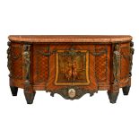 A French ormolu mounted mahogany and cherrywood parquetry veneered D shaped commode à vantaux with a