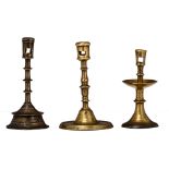 A lot of three various bronze candlesticks, 16th/17thC, H 19,5 - 22,5 cm