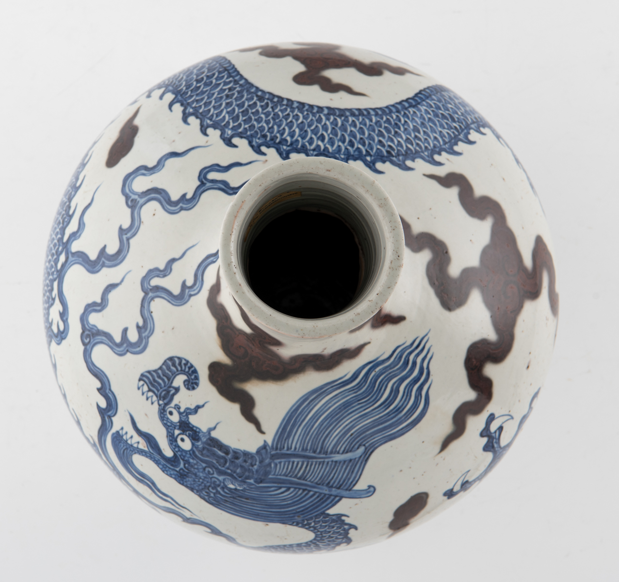 A Chinese cobalt blue and copper red bottle vase, decorated with a dragon amongst clouds, H 41 cm - Image 5 of 6