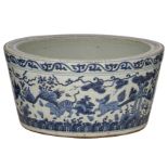 A Chinese blue and white Ming type wash basin, decorated with mythical animals amidst flowers and