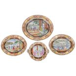 Four Chinese Rockefeller pattern export porcelain plates, famille rose decorated with daily life