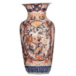 An imposing Japanese Arita Imari vase, decorated with flower sprays and panels filled with birds