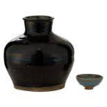 A Cizhou stoneware black glazed storage jar, Northern Song Jin Dynasty, maybe period; added a Jun