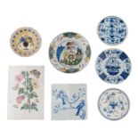 One blue and white and one polychrome decorated Delftware tile panel, decorated with branches with