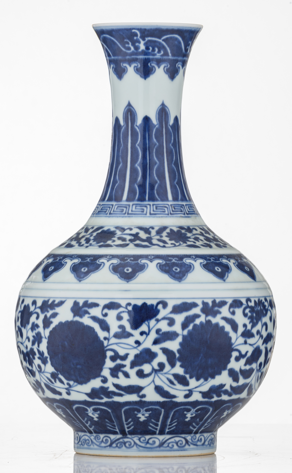 A Chinese blue and white bottle vase, decorated with the design of a meandering foliate scroll, with - Image 4 of 7