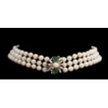 A three strand cultured pearl 'ras du cou' necklace, the 18ct white gold extender set with brilliant