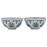 A fine pair of Chinese doucai cups, decorated with stylised motifs, marked Yongzheng, H 5 - ø 9,5