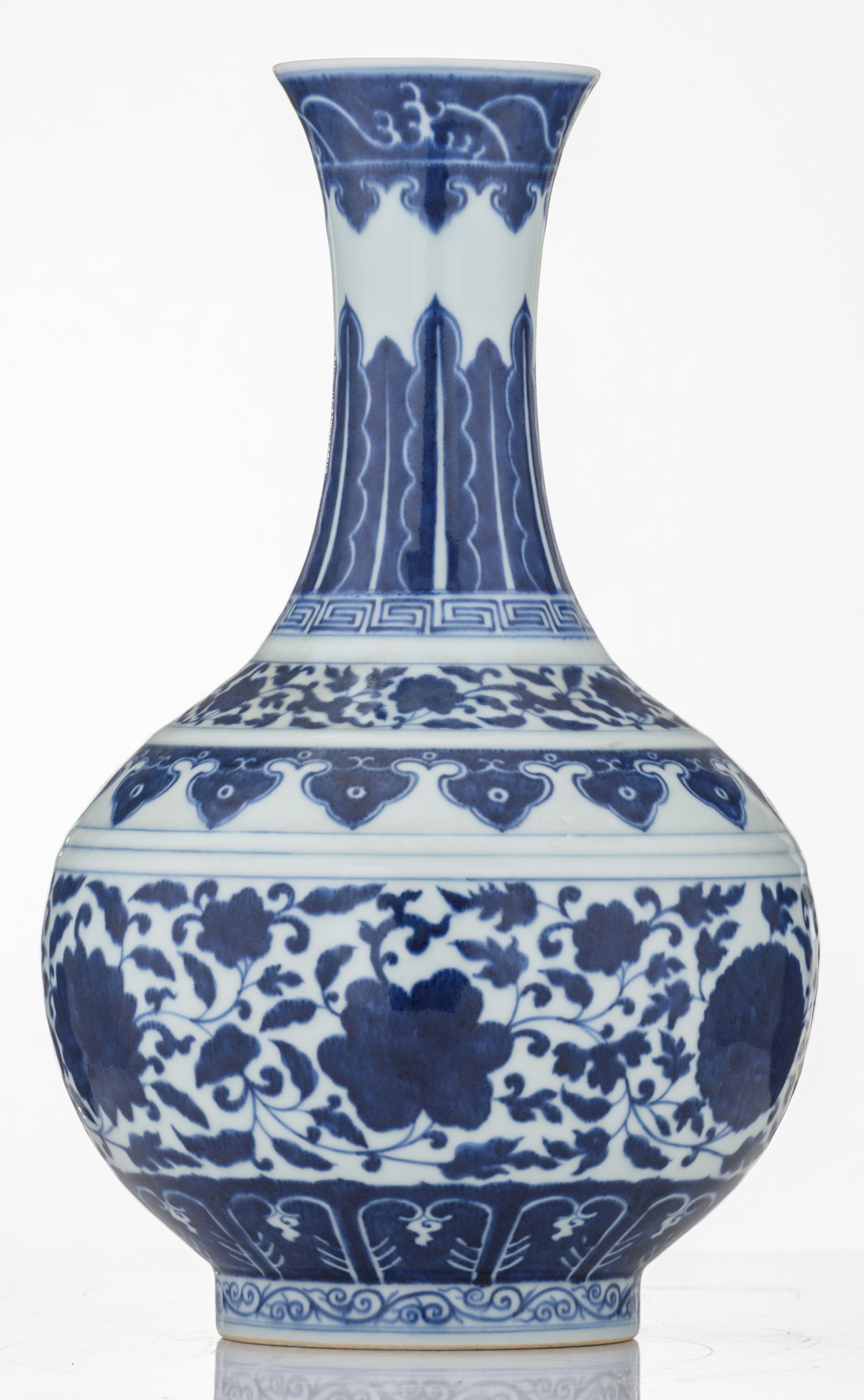 A Chinese blue and white bottle vase, decorated with the design of a meandering foliate scroll, with - Image 3 of 7