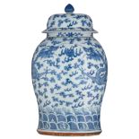 A large Chinese blue and white vase and cover, decorated with dragons amid clouds, 19thC, H 63 cm