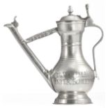 A rare 18thC Swiss pewter 'Stegkanne' or wine flagon, with the inscription 'Gewunnen Feld Vener