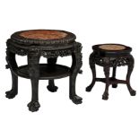 Two Chinese richly carved wooden stools with a marble top, H 43 - 59 - ø 39 - 66 cm