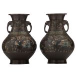 Two Chinese bronze archaic champlevé vases, the handles elephant's head shaped, with a Xuande